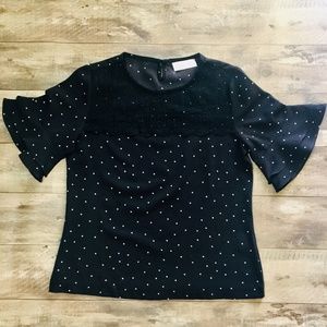 Black polka dots top